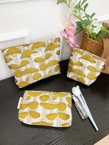 Detail view of canvas mushroom embroidered cosmetic bags, portable makeup storage pouch set.