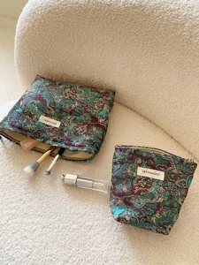 Chinese style dragon pattern cosmetic bag set, spacious travel makeup pouch and organizer detail.