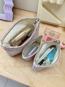 Set of 3 purple floral cosmetic bags, cute portable makeup pouch for travel and daily use.