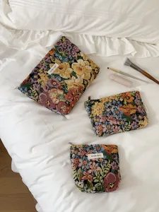 Vintage floral tapestry cosmetic bags set, elegant large capacity makeup pouch for travel.