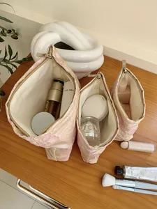 Gold silk floral jacquard cosmetic bag, pleated texture large capacity pouch organizer.