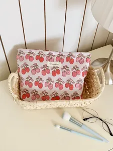 Cute strawberry print cosmetic pouch, portable makeup storage bag for travel and daily use.