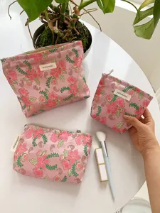 Cute floral cosmetic pouch set fabric makeup storage bag portable toiletry organizer case.
