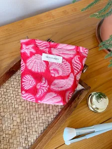 Large capacity cosmetic bag with stylish shell pattern, perfect for travel and daily use.