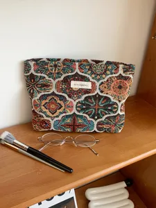 Vintage woven cosmetic bag makeup pouch travel organizer clutch for daily portable use.