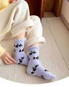 Cozy purple coral fleece fuzzy socks with cute panda pattern for warm indoor winter wear.