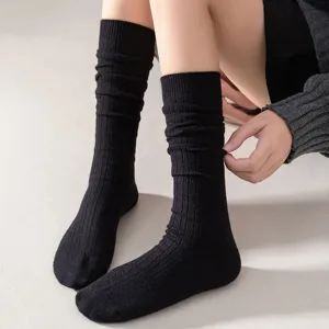 Solid color cashmere over-the-knee socks for women, winter warm ribbed wool long socks main view.