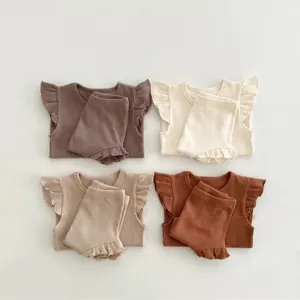 Cute baby ribbed short sleeve top and shorts set detail, soft cotton infant summer clothing.