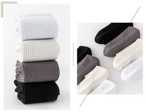 Close-up detail of men's athletic socks with breathable honeycomb sole and ribbed cuffs.