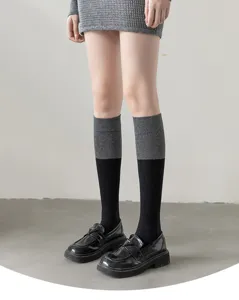 Women two-tone calf socks, black and dark grey color block knit socks for stylish daily wear.