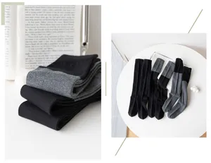 Detail view of black and grey colorblock long socks, soft knit texture for daily wear.