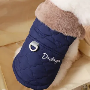 Close-up detail of dog winter coat with soft fur collar and quilted navy fabric design.