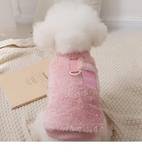 Pink fleece dog vest for small dogs, winter warm pet apparel with built-in leash D-ring.