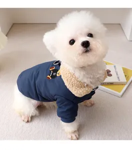 Detailed view of the winter dog coat with plush collar and cute bear embroidery patch design.