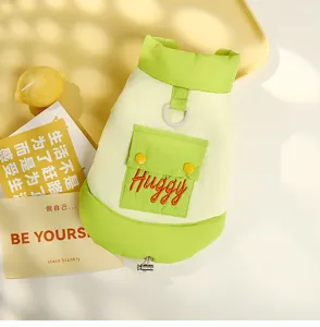 Detailed view of cute candy color warm dog winter vest featuring high collar and ring.