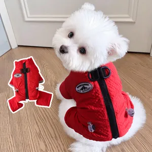 Warm fleece-lined winter dog coat with back zipper and leash ring, cozy red pet apparel.