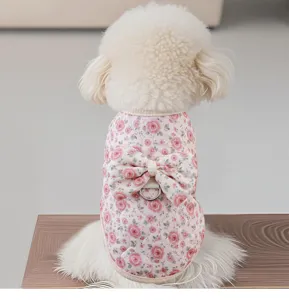 Pink floral quilted pet vest detail, cute back bow and leash D-ring for small dogs.