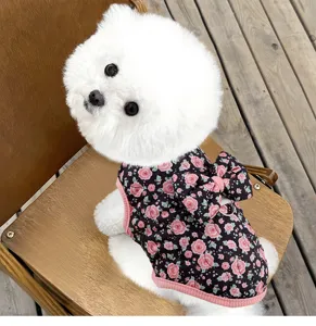 Detailed close-up of floral padded pet vest with cute bow on back for small dogs daily wear