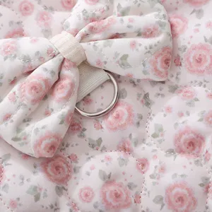 Pink floral quilted pet vest for small dogs with cute bow and metal D-ring main view