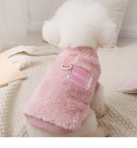 Detailed view of a fluffy pink fleece dog vest for small dogs, cozy winter pet apparel.