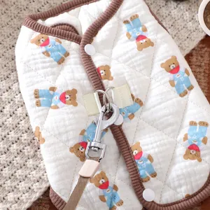 Cute quilted pet vest detail showing soft fabric, adorable bear print, and secure leash D-ring.