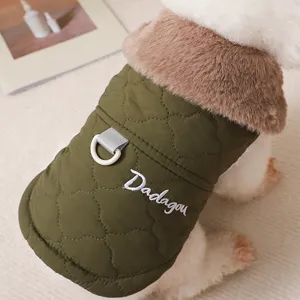 Close-up detail of the warm pet vest featuring soft brown fur collar and secure leash D-ring.