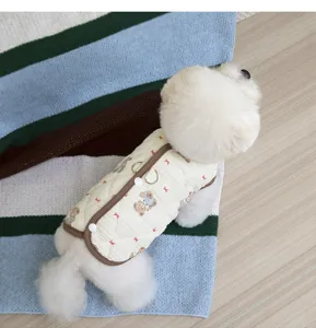 Thickened warm winter pet vest for small dogs with cute bear print and secure traction D-ring.