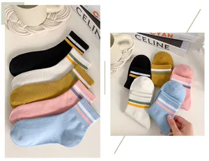Detailed closeup of casual cotton women's short socks featuring stylish double stripes in multi colors.