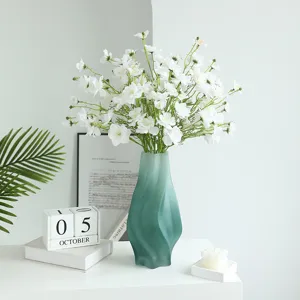Artificial white flower bouquet with gradient green glass vase for home decor and party props.