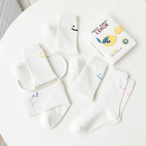 Chaussettes blanches femme style japonais visage souriant brodé coton chaussettes mi-hautes