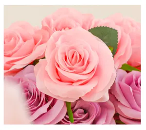 Closeup of artificial rose bouquet, Morandi pink and purple flowers with detailed petals.