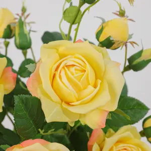 Artificial yellow roses bouquet faux flowers for home decor wedding party floral arrangement.