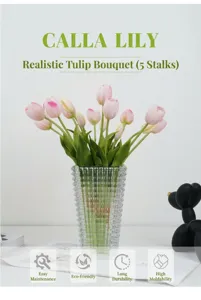 Artificial tulip bouquet detail shot with clear glass vase and decorative desktop.