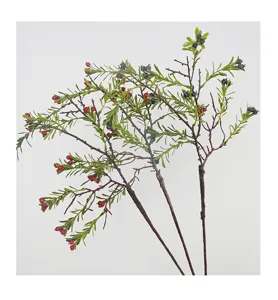 Close-up detail of artificial pyracantha berry branch with red and blue fake fruits for decor.