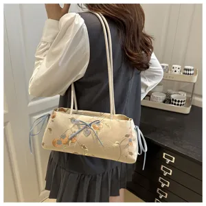 Chic Chinese style retro shoulder bag with cute bows and elegant floral jacquard pattern for women.