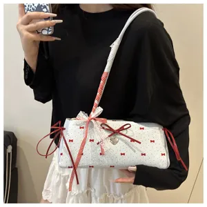 Sweet bow underarm shoulder bag with cute lace trim and stylish contrast design for women.