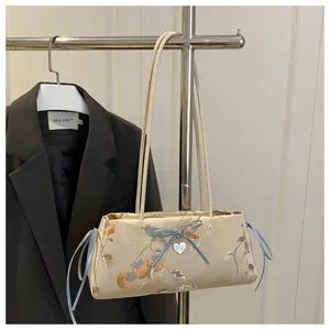 Chinese style satin shoulder bag with elegant bow and persimmon pattern, chic underarm bag.
