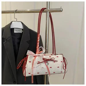 Cute red bow lace underarm shoulder bag for women, stylish white red polka dot design.