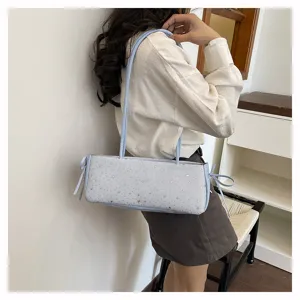 Chic light blue shoulder bag for women, stylish underarm bag featuring cute star patterns.