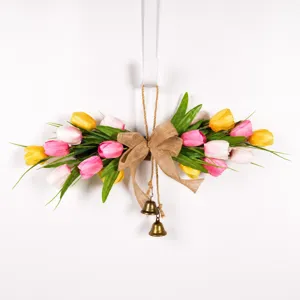 Artificial tulip wreath door hanging decoration with burlap bow and bells for front door.