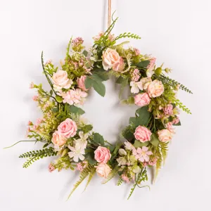 Artificial rose floral wreath detail view, Nordic style green plant wall hanging decor for home wedding.