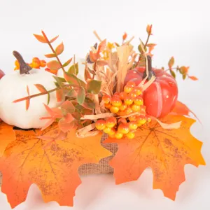 Autumn artificial pumpkin maple leaf centerpiece decoration for thanksgiving and halloween table.