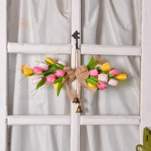Artificial tulip flower garland swag with burlap bow and bells for front door home wall decor.