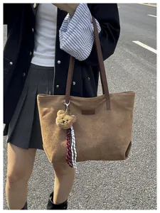 Casual brown suede tote bag with cute bear pendant, spacious daily commuter shoulder bag.