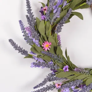 Artificial lavender wreath detail, purple floral door hanging decor for home wall.