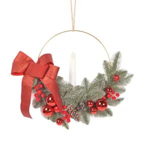 Christmas wreath decoration with metal ring pine needles red bow candle for holiday home decor.