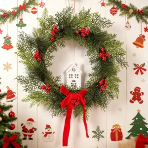 Detailed view of Christmas wreath with pine branches, red berries, and velvet bow for decor.