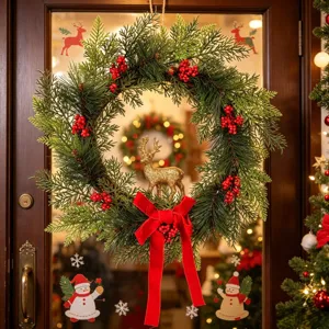 Christmas wreath for front door with pine branches red berries gold deer and velvet bow decor