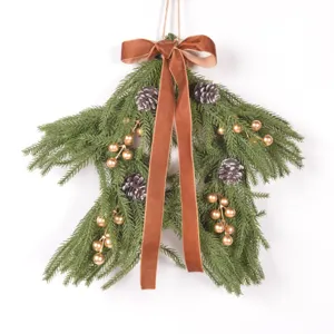 Christmas star pine wreath wall hanging with gold berries pinecones and brown velvet bow decor