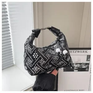 Chinese style embroidered hobo bag unique black shoulder handbag trendy daily accessory.